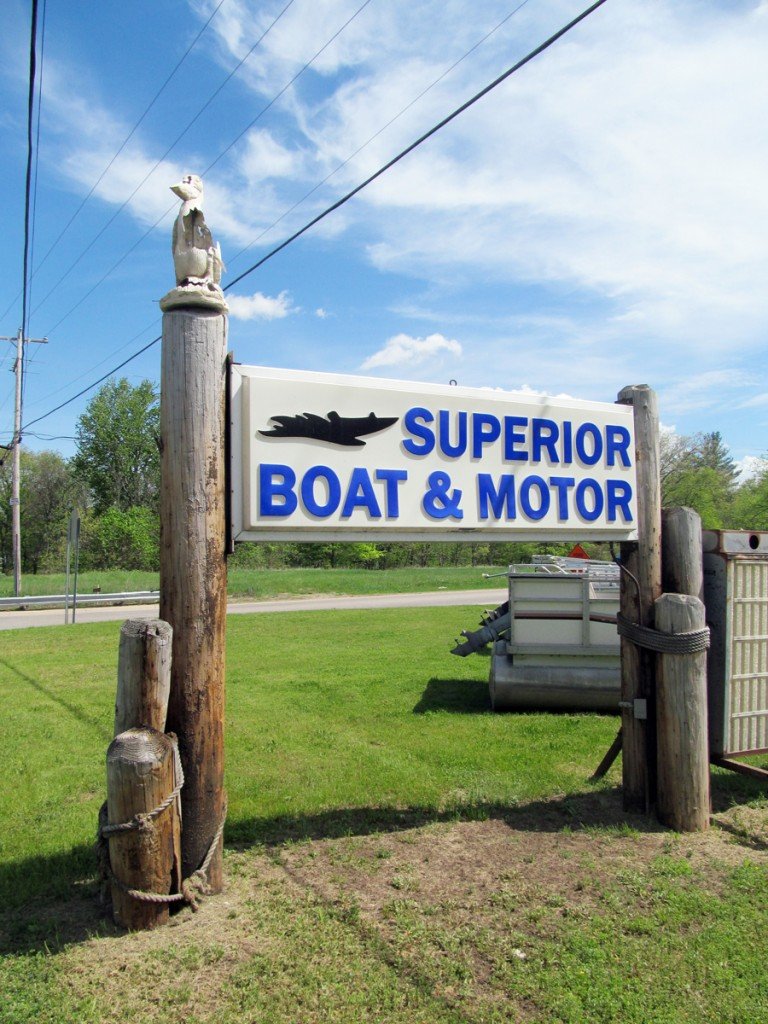 Superior Boat & Motor sign at the shop in Stanton, Michigan