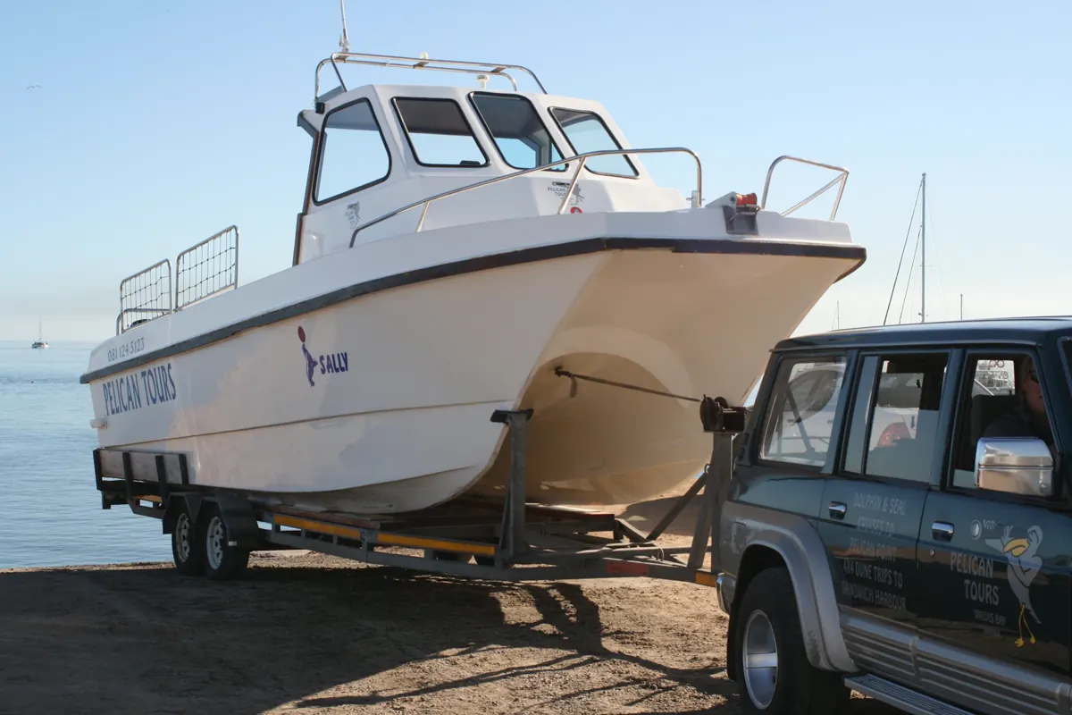 Boat being towed on a trailer